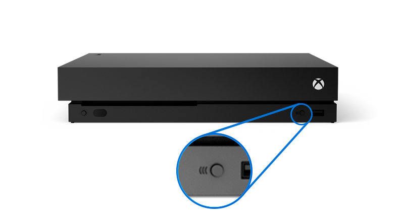 Консоль Xbox One X Кнопка "Привязать" находится на передней панели справа, рядом с портом USB.